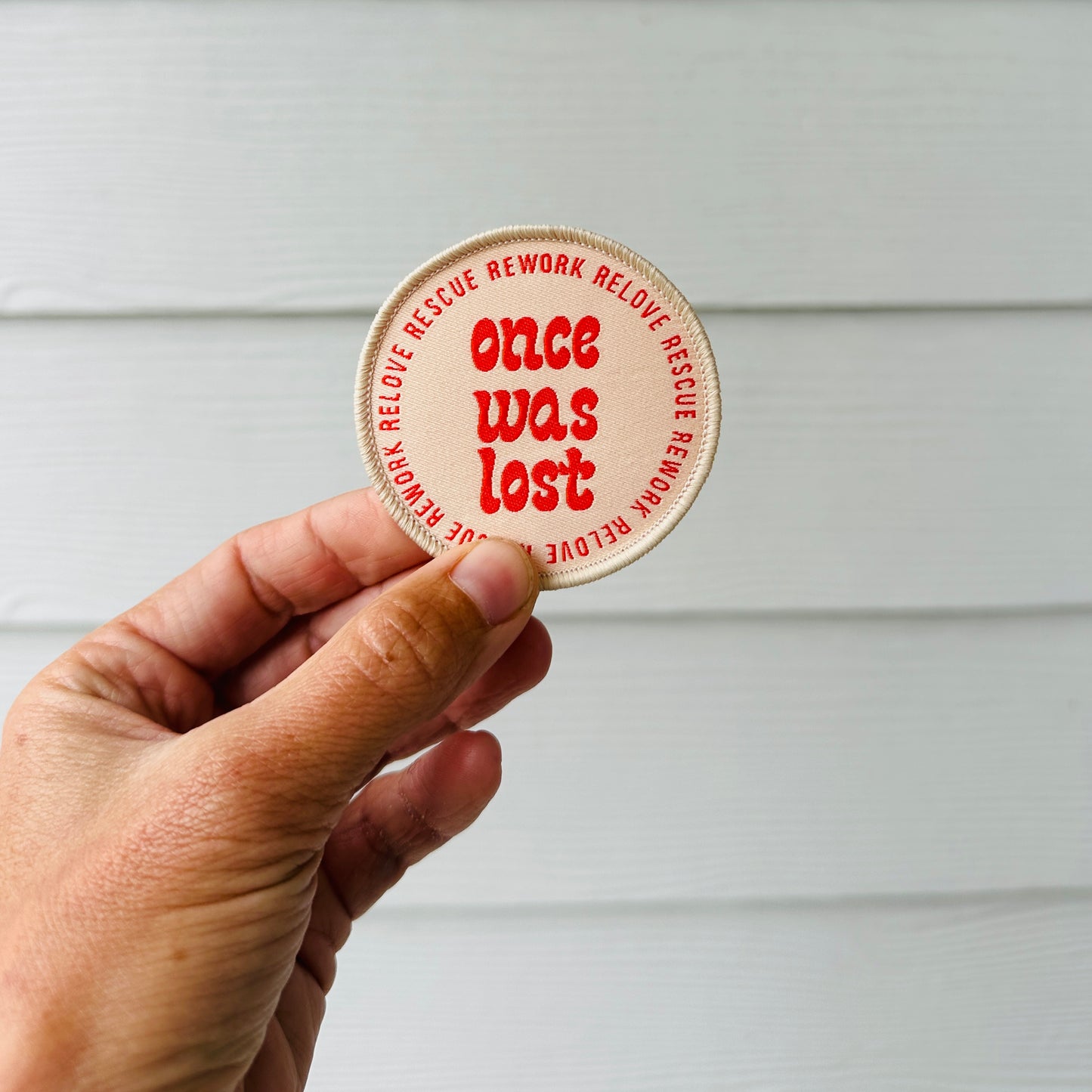 Once Was Lost 100% Recycled Badge