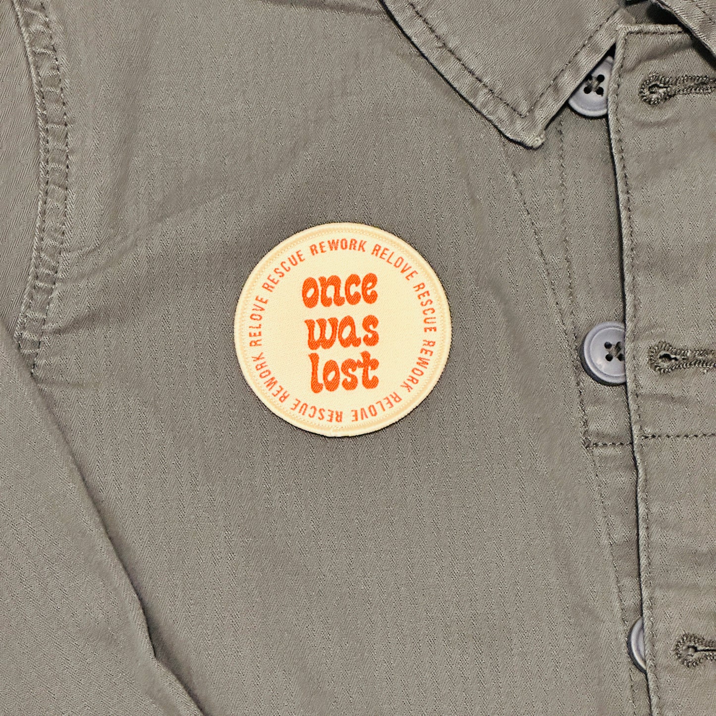 Once Was Lost 100% Recycled Badge