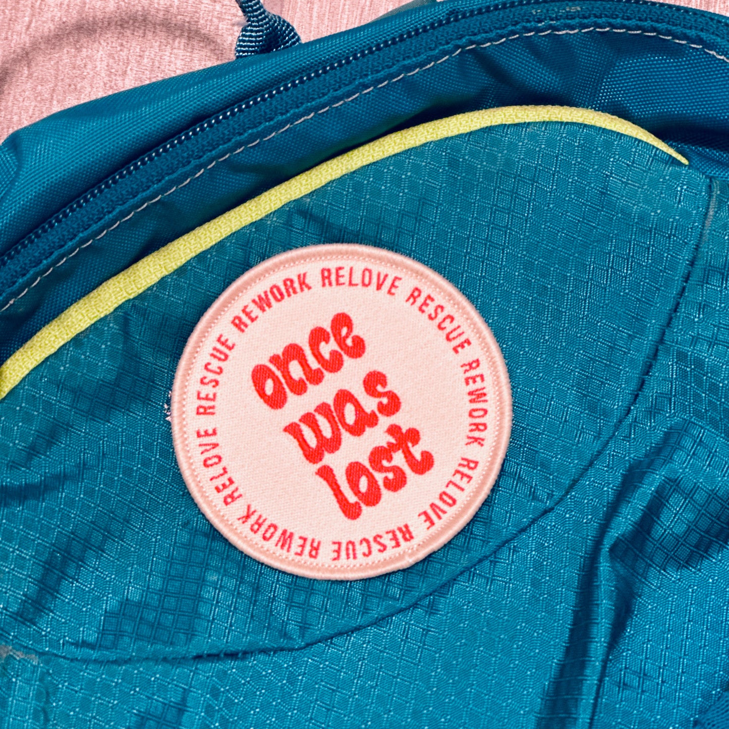 Once Was Lost 100% Recycled Badge